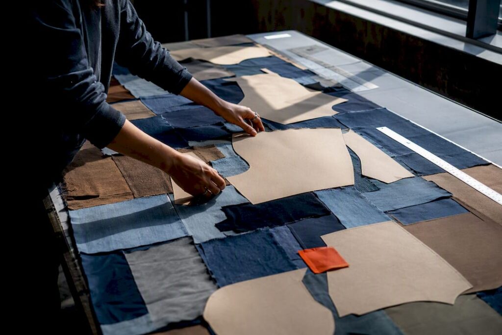 Fabric offcuts arranged around pattern pieces