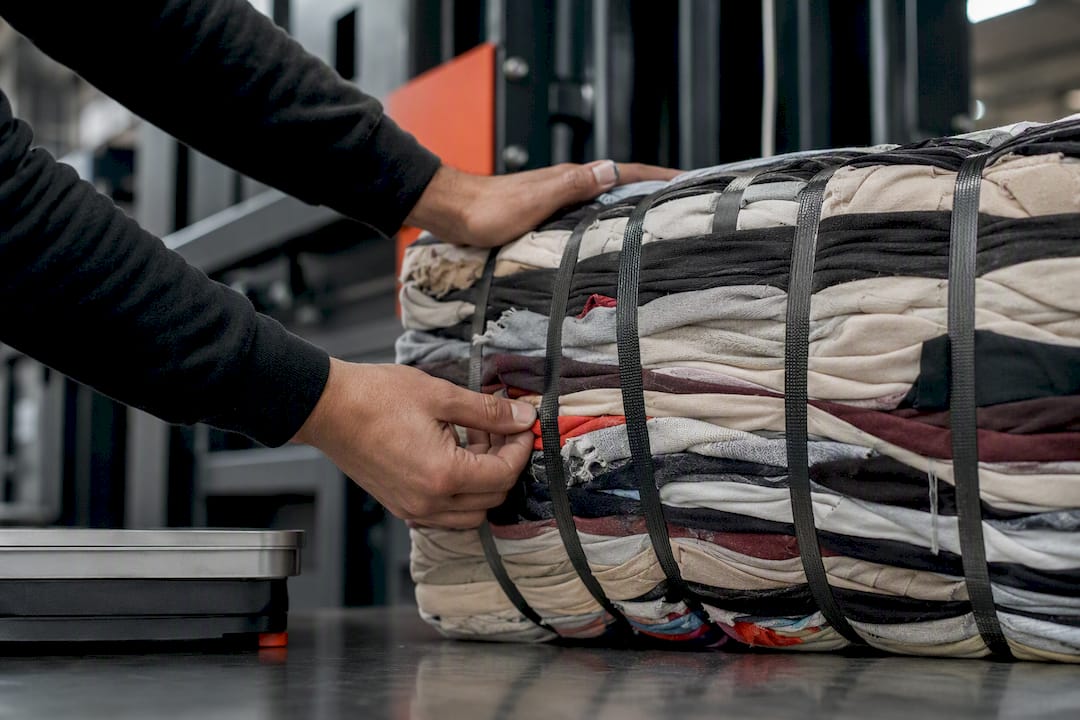 Close-up of compressed textile bale straps